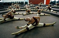 Gymnastics PIM 014  Countryside High dancers stretch as they prepare to perform in a band competition. - PhotosinMotion.net. : Countryside High dancers pictures, Tampa SPORTS photographer, high SCHOOL pictures, GYMNASTICS, PhotosinMotion.net